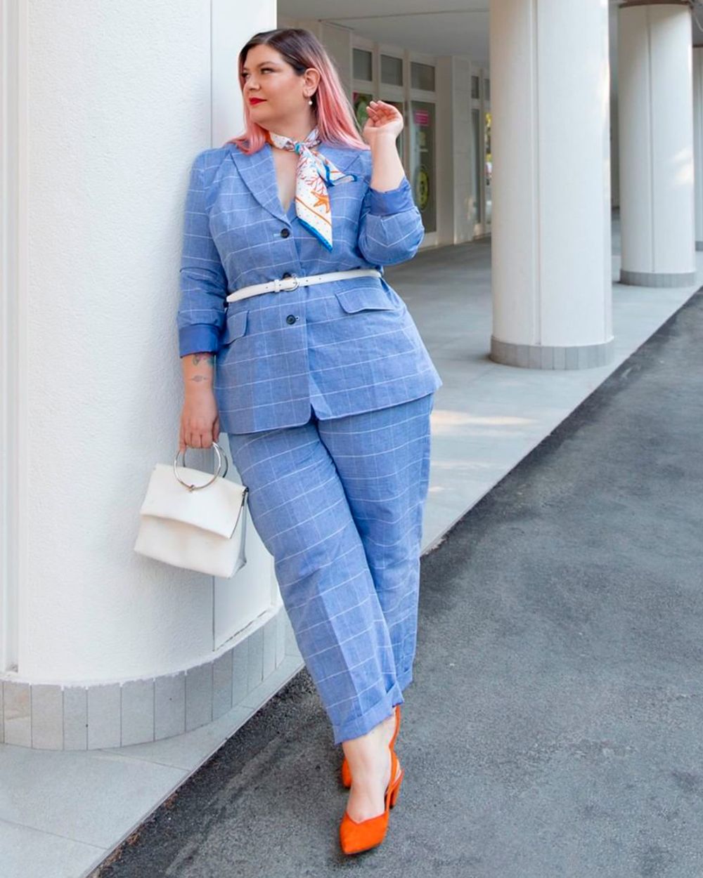 Blue checked pantsuit and orange shoes